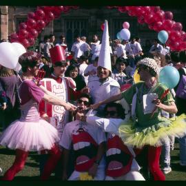 Dental Students Dressed as Tooth Fairies on Front Lawn