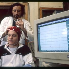 Student Measuring Brain Waves of Another Student 