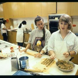 Education Home Economics Class Students Preparing Food in the Kitchen