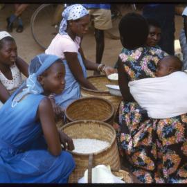 Women with Baskets of Grains