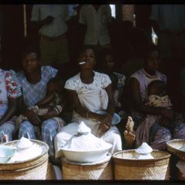 Women with Baskets of Grains