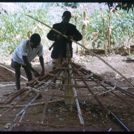 Men Building with Sticks and Bamboo