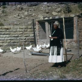 Woman Outside Chicken Coop