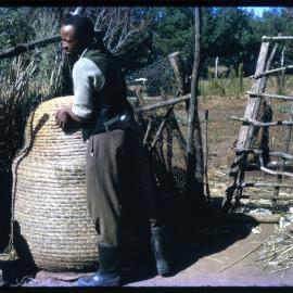 Man with Large Woven Basket