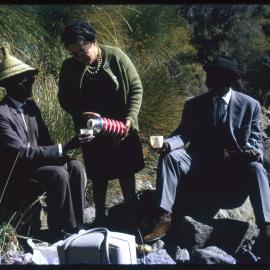 Three People Sharing a Drink