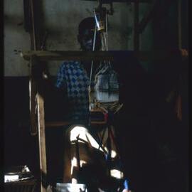Woman Using Loom