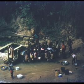 Group of People in Stream