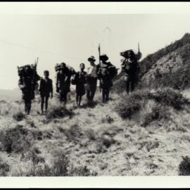 Porters at the Base of Mount Wilhelm