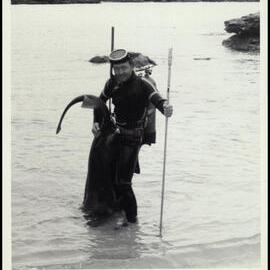 John Thompson Holding a Speared Fish