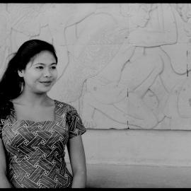 Woman Standing in Front of Relief in Indonesia