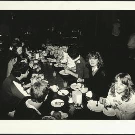 Male and Female Students at Evening Dinner at College