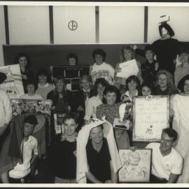 Group Photo of Students from the Teaching Shakespeare Unit Displaying Posters and Costume Items