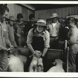 Students Learning How to Handle Sheep at the Animal Reproduction Unit with Mr J Ellsmore Looking on