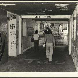 Students Walking Through the Graffiti Tunnel