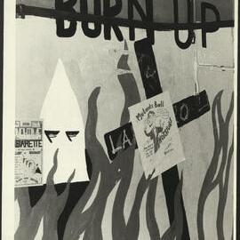 Close-Up of Graffiti in Graffiti Tunnel Entitled 'Burn UP' and Two Posters Stuck to the Wall                  