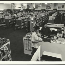 Interior of the Co-Op Bookshop with Two People at the Service Desk
