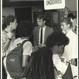 Students Making Enquiries at the Student Centre at the Northern End of the Main Quadrangle