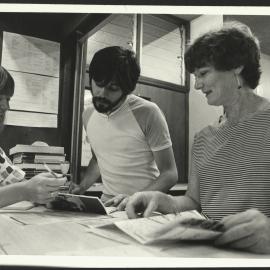 A Staff Member Assisting a Student at the Student Centre Enquiry Counter