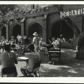 Staff and Students Listen to Union Debating Teams Perform in the Quadrangle (2)