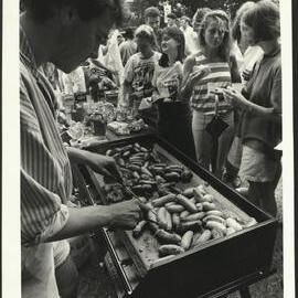 Students Queuing for Sausages at the Barbeque