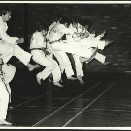 Students Practicing Jump and Kick During Martial Arts Class at the HK Ward Gymnasium