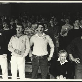 Spectators at the Intercollegiate Football St Paul's vs St John's Standing in the Stand and Singing