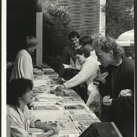 Students Checking Display at the Travel Day Stall Operated by Facilities at the Holme Building