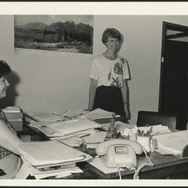 Three Financial Assistance Section Staff Members in Their Office