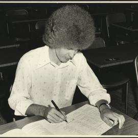 Mr O'Hare, Student Centre Admissions Officer, Completing an Enrolment Form