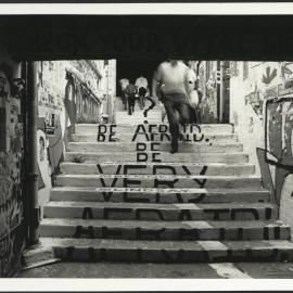 Stairs in the Graffiti Tunnel Displaying the Text 'Be Afraid Be Very Afraid'