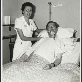 Faculty of Nursing - Clinical Practice Nursing Student on the Ward Attending to Patient