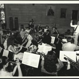 Peter Platt Conducting the Pro Musica Orchestra in the Great Hall