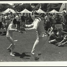 Orientation Week - Students Fencing on Front Lawn