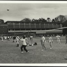 Students Play a Lunchtime Volleyball Game on the Hockey Field