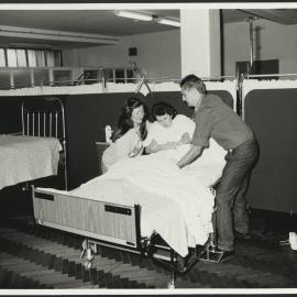 Faculty of Nursing - Practicing Nursing Skills Students Practice Assisting Patient to Sit Up in Bed