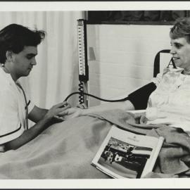 Faculty of Nursing - Student Taking Blood Pressure of a Simulated Patient