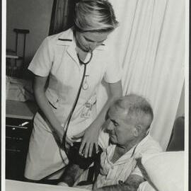 Faculty of Nursing - Clinical Placement Student About to Take Blood Pressure