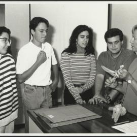 Faculty of Nursing - Students Listening to a Lecturer Learning About the Life Sciences
