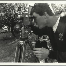 Engineering Students Surveying on University Campus