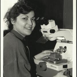 Biology - Student Using the Microtome to Slice Ultrathin (0.000005mm) Sections of Tissue for Examination