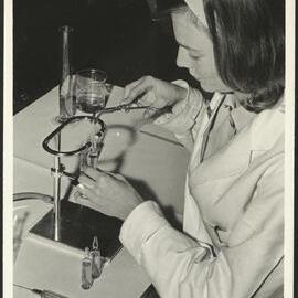 Pharmaceutical Chemistry Laboratory Female Student Preparing Ampoules