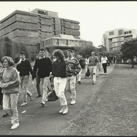 Students Cross Cadigal Green from the Wentworth Building toward the Engineering Complex
