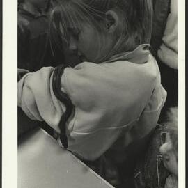 A Child Watching a Snake on Their Arm During Open Day 1988
