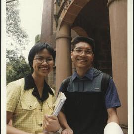 Vietnamese Agricultural Economics Students Tran Thi Hai (L) and Huu Chi Truong Outside the Agriculture Building
