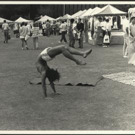 Student Doing Handstand on Front Lawn During Orientation Week