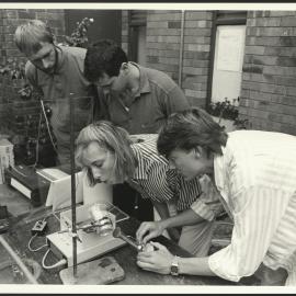 Engineering Design Competition -Four Students Undertaking (Audio ?) Experiment