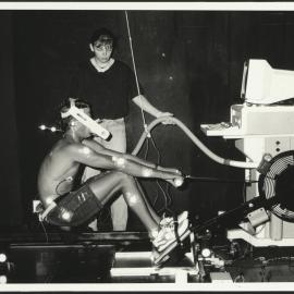 Faculty of Health Sciences - Physiology Exercise: a Student is Monitored While on a Rowing Machine