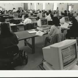 Large Class Room of Students Working in Computer Room