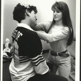 Health Sciences Students Practicing Manipulation on Neck