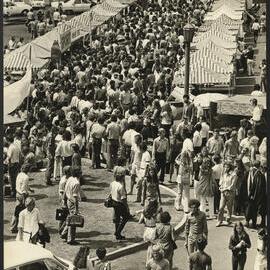 Crowd of Students Walking Between the Stalls on Front Lawn for Orientation Week